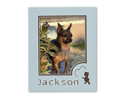 An example of what this custom 11x14 bear mat looks like with a personalized name and 8x10 photo.