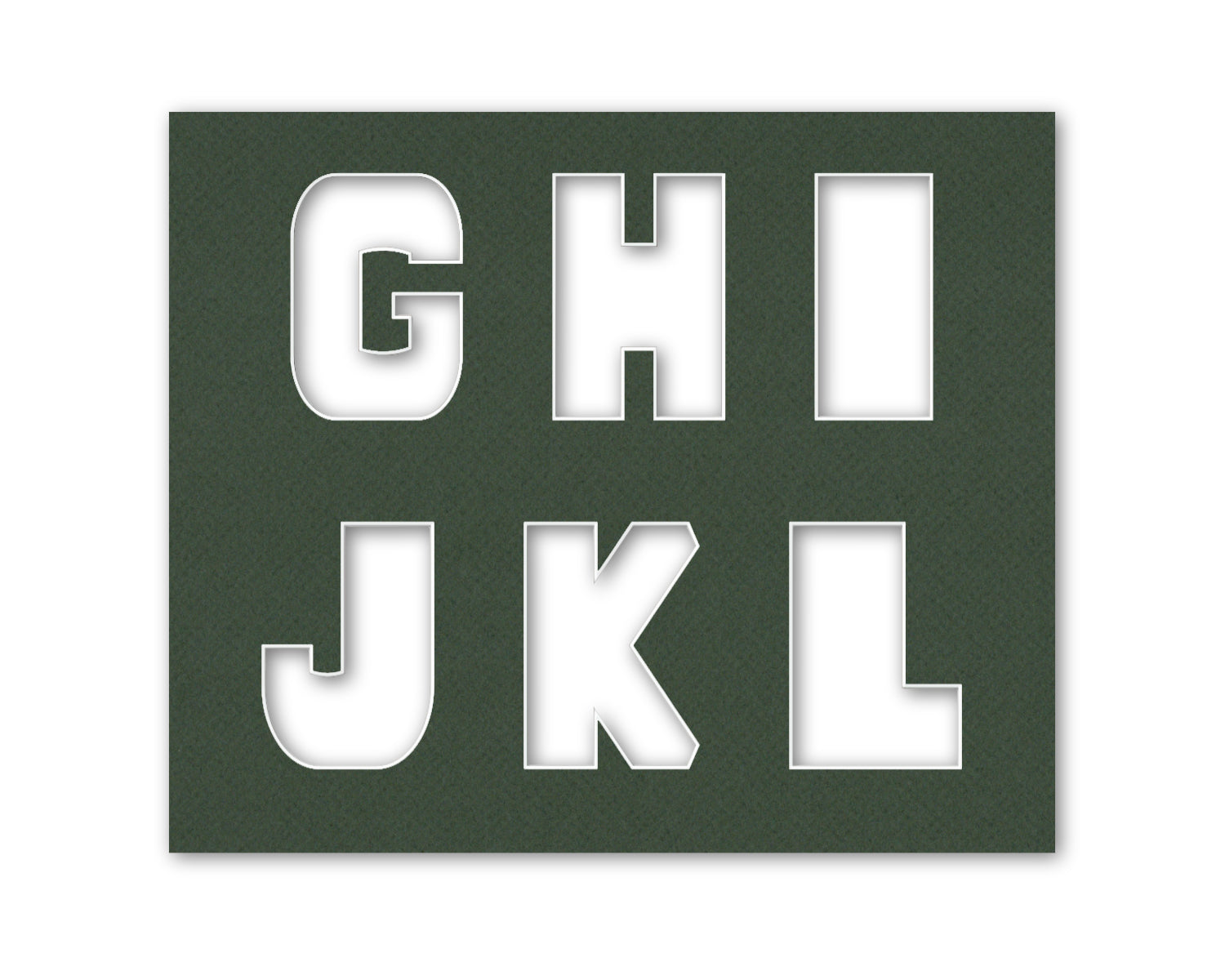 An example of what letters G-L look like when cut out of the matboard.